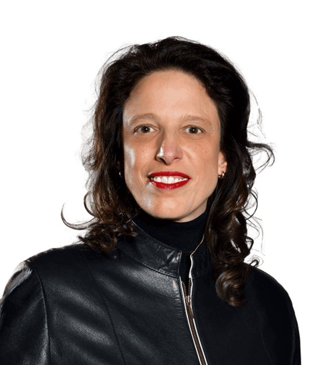 Portrait of a smiling woman with shoulder-length dark hair wearing a black leather jacket facing the camera.